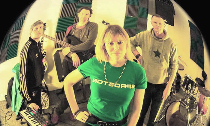 Studio photo of the band Keeley using a fisheye lens